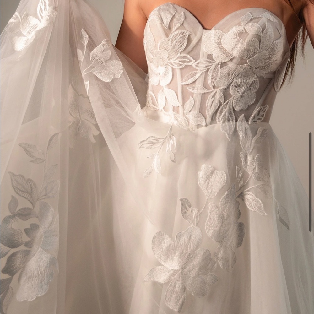 Stella York new with tags, never worn. Size 12. Chic Strapless Ivory Gown - Picture 5 of 12